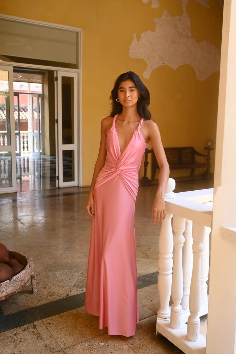 Corinne pink maxi dress front close up showing plunging V-neckline and ruched twist front waist