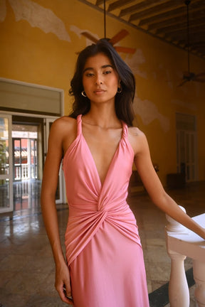 Corinne pink maxi dress front view showing flattering gathered waist and flowing silhouette